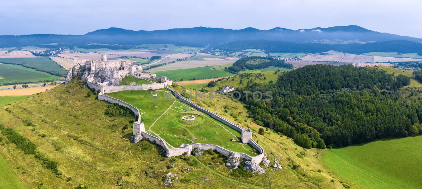 Aerial view of Spis (Spiš, Spišský) castle, Unesco Wold Heritage, Slovakia, second biggest medieval castle in Middle Europe.