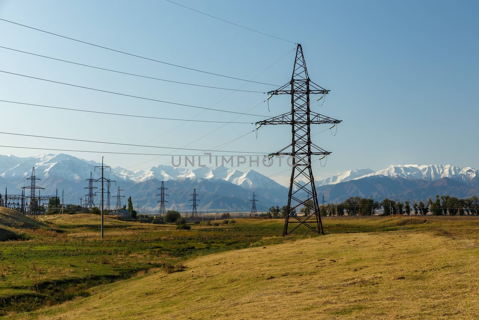 high-voltage power line in the mountains, electric high voltage power post, Chuy Region, Kyrgyzstan