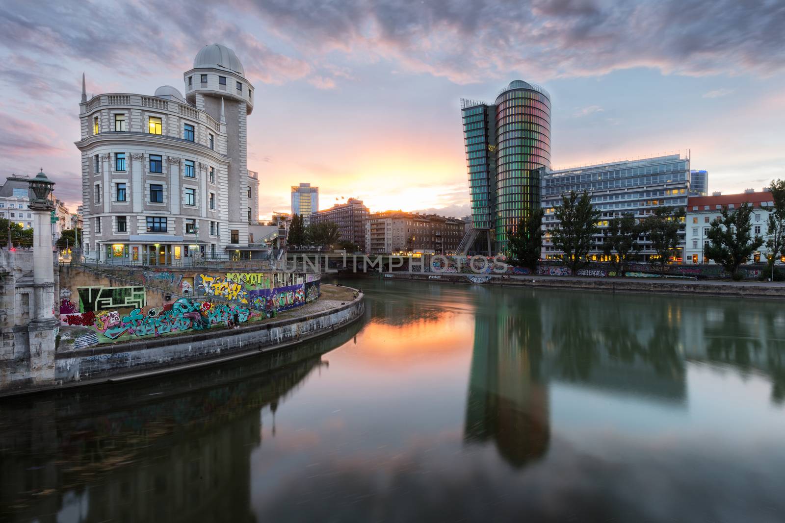 The Danube Canal in Vienna at Night with Urania and Uniqa Tower, Vienna, Austria