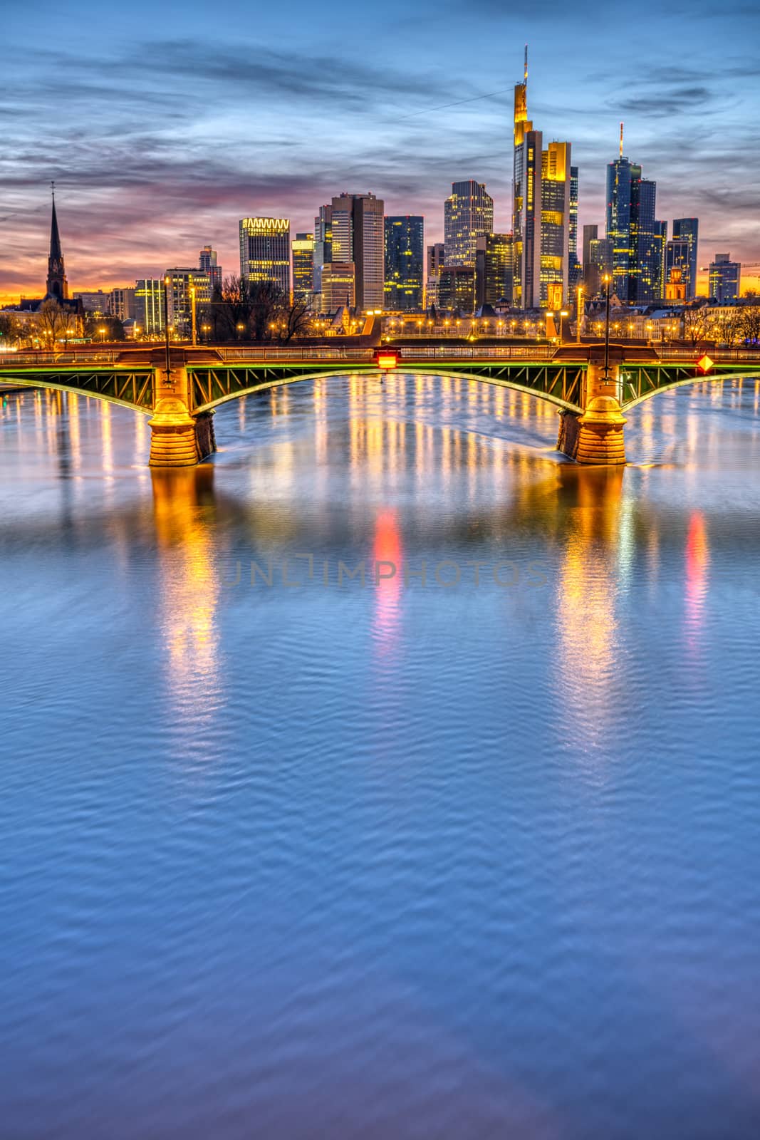 The river Main with the famous skyline of Frankfurt after sunset