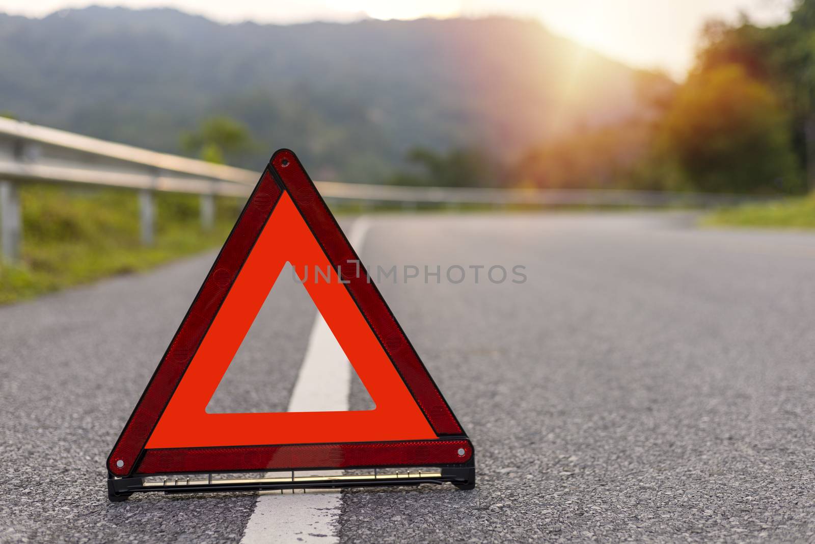 Red triangle, red emergency stop sign, red emergency symbol on road. With copy space for text or design