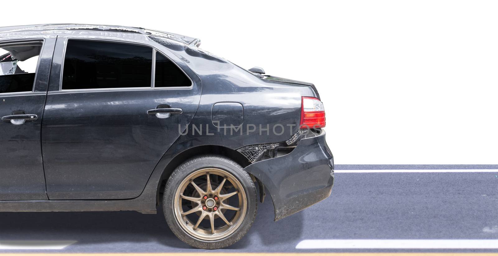 back side of Black color car damaged and broken by accident isolate on white background. Save with cliping path.