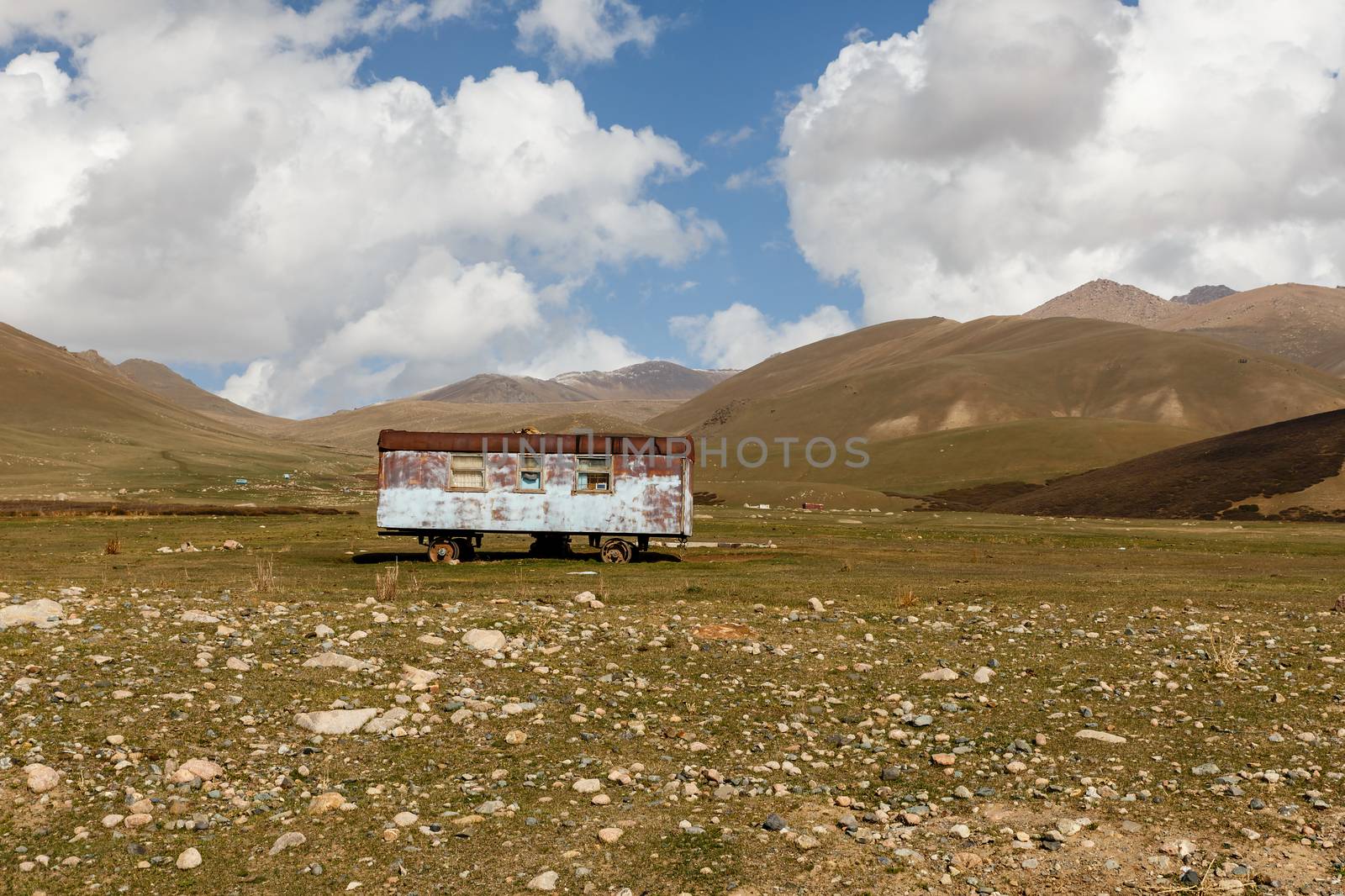 old abandoned wagon in the mountains, nomad wagon, Kyrgyzstan