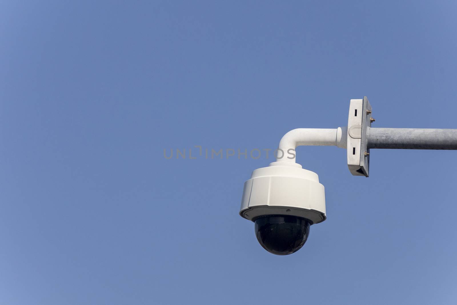 CCTV trafic camera on clear sky background with copy space for text or design.