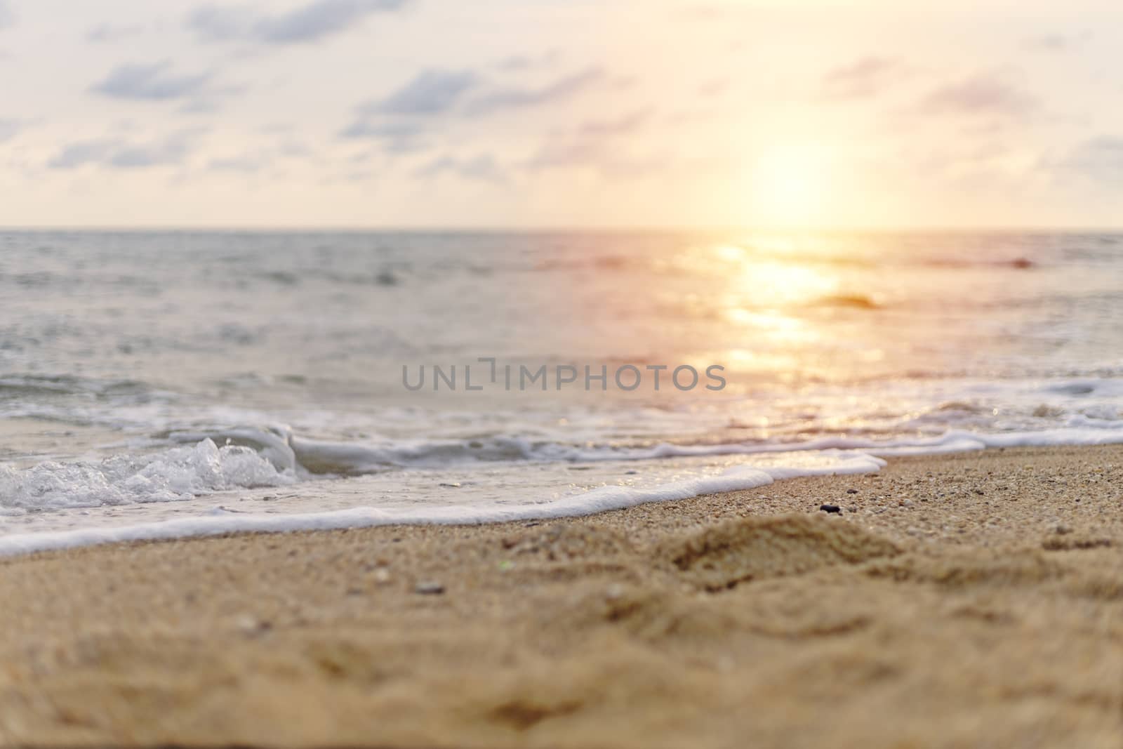 close up sand of sea sand and sunset sky. With copy space for te by Satrinekarn