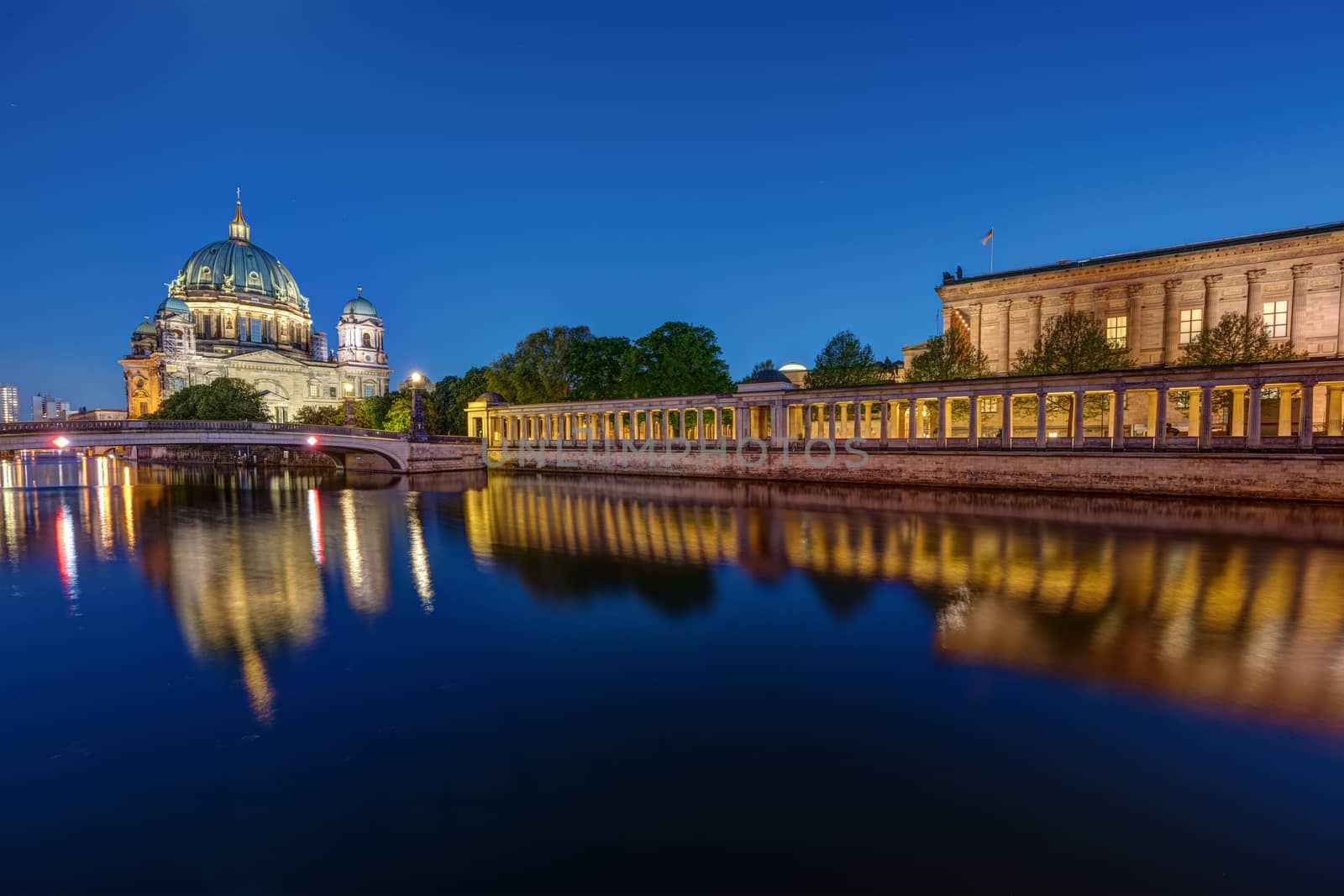 The Berlin Cathedral and the Old National Gallery on the Museum Island in Berlin at night