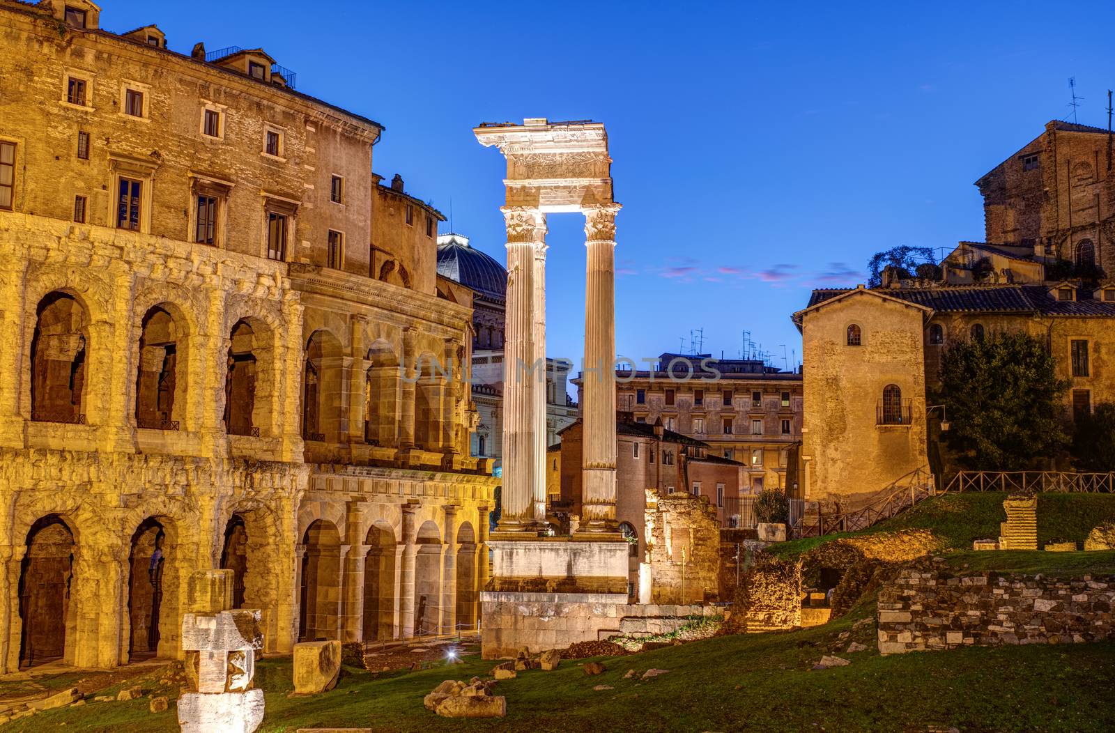 The Theatre of Marcellus and the Temple of Apollo Sosianus in Rome, Italy, at dusk