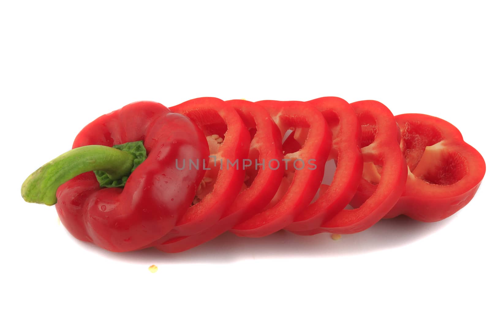 Slide fresh red bell pepper. Sweet pepper. Giant pepper. Isolate on white background. Save with clipping path.