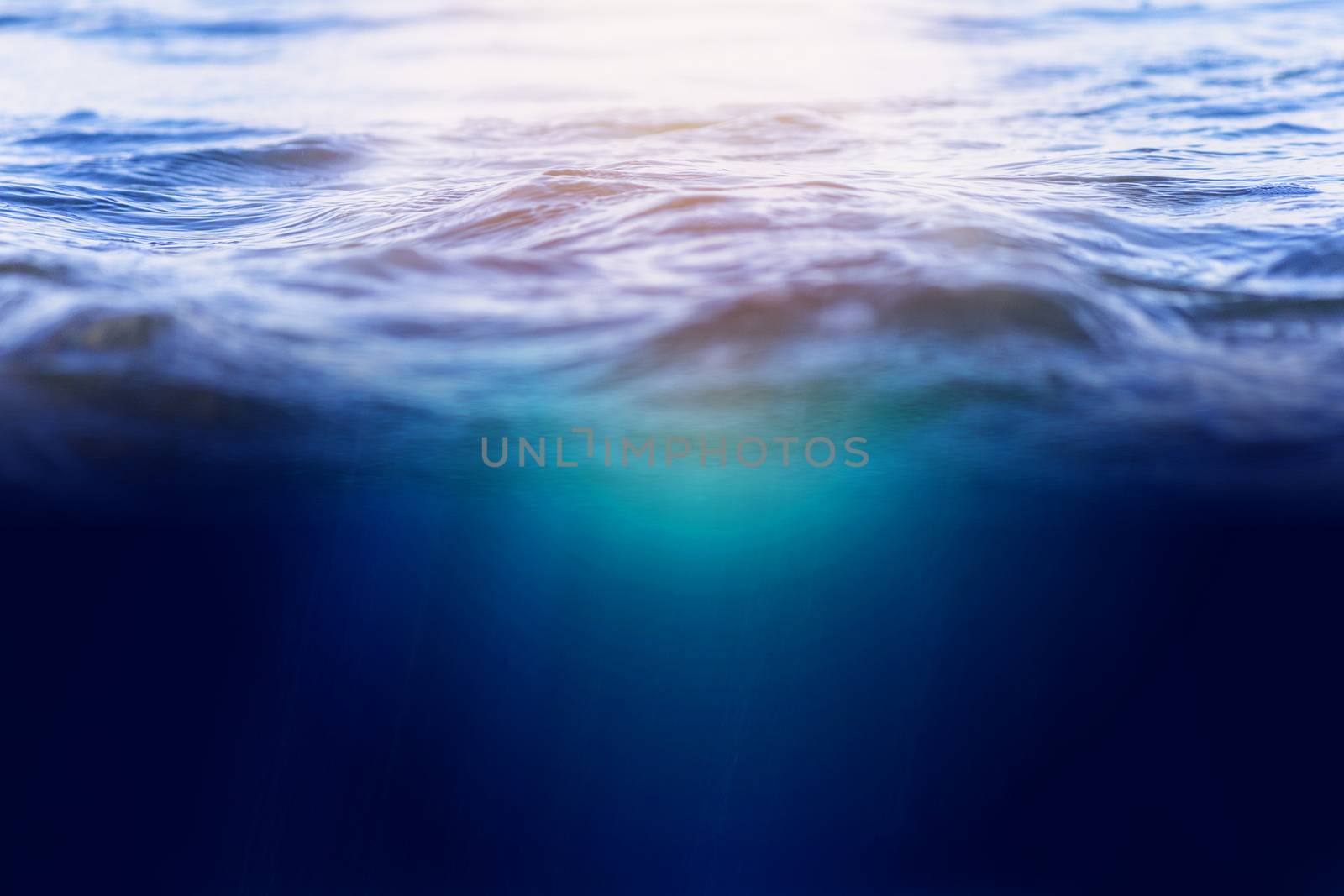 Sea water with underwater background. With copy space for text or design.