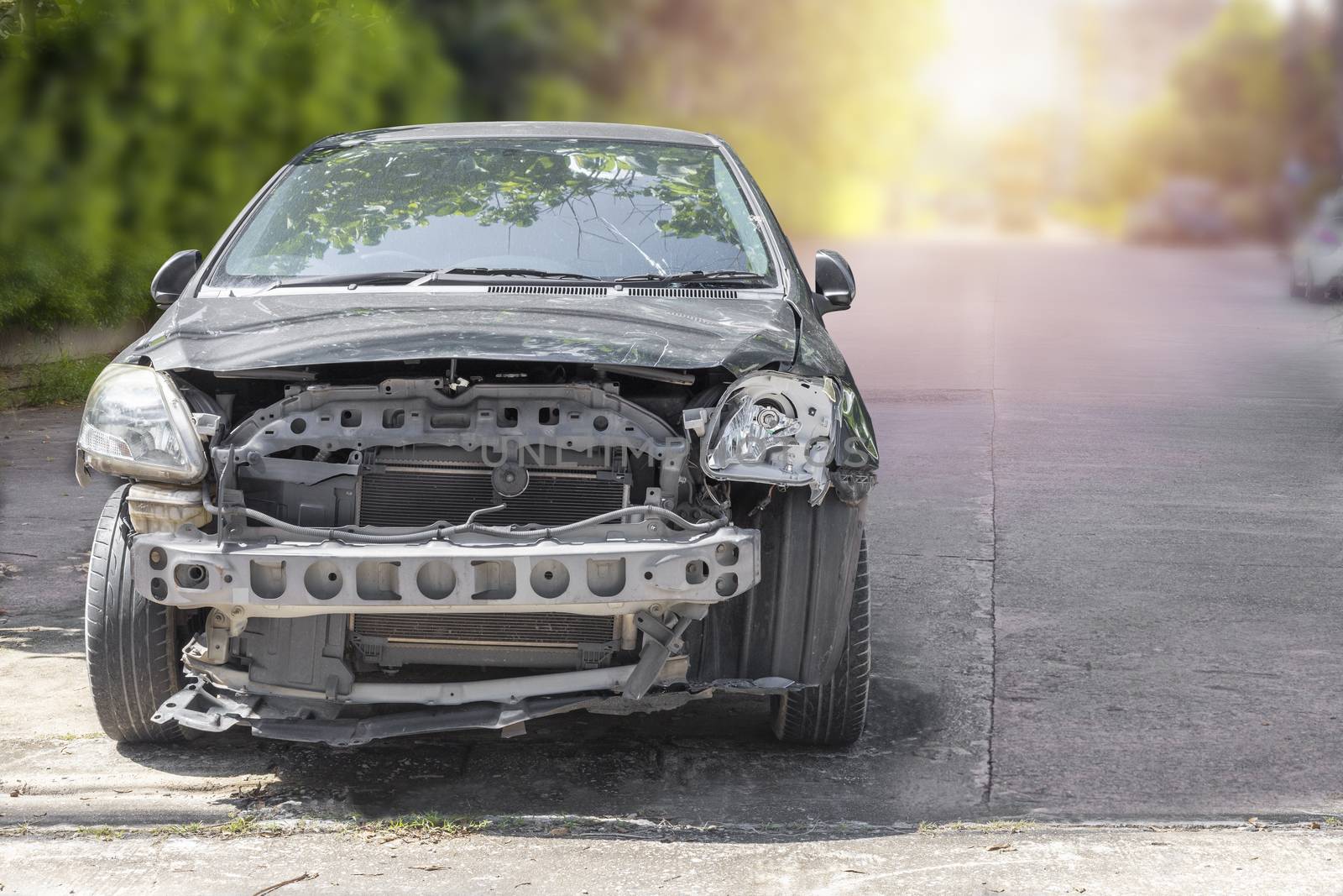 Front of black color car damaged and broken by accident . Isolate on white background. Save with cliping path