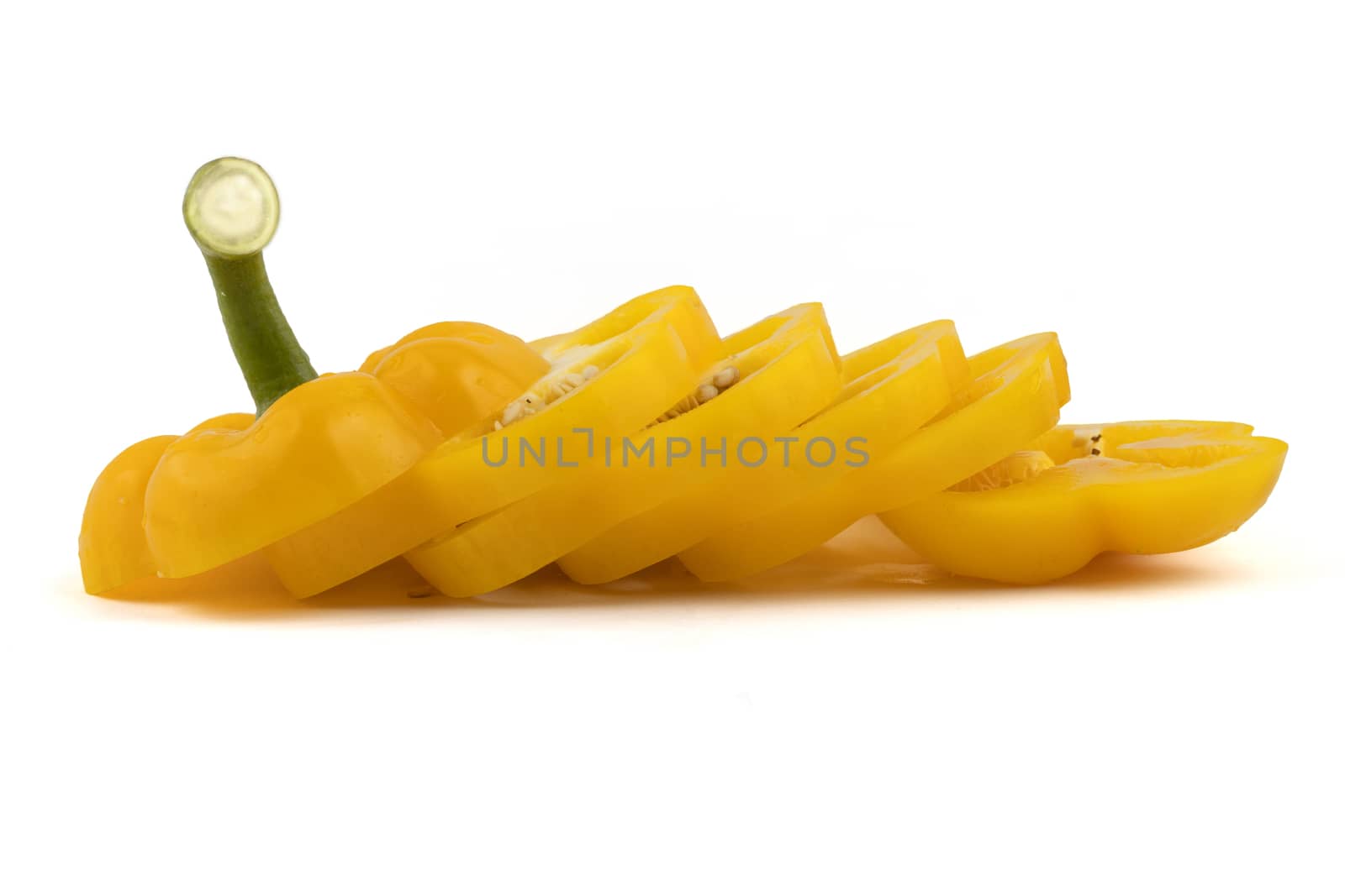 Slide fresh yellow bell pepper. Sweet pepper. Giant pepper. Isolate on white background. Save with clipping path.