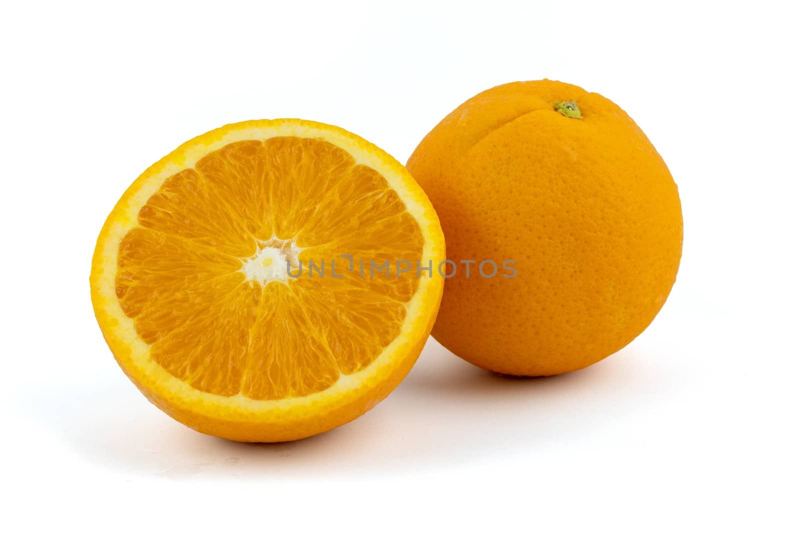 Fresh navel oranges isolated on white background. Save with clipping path.