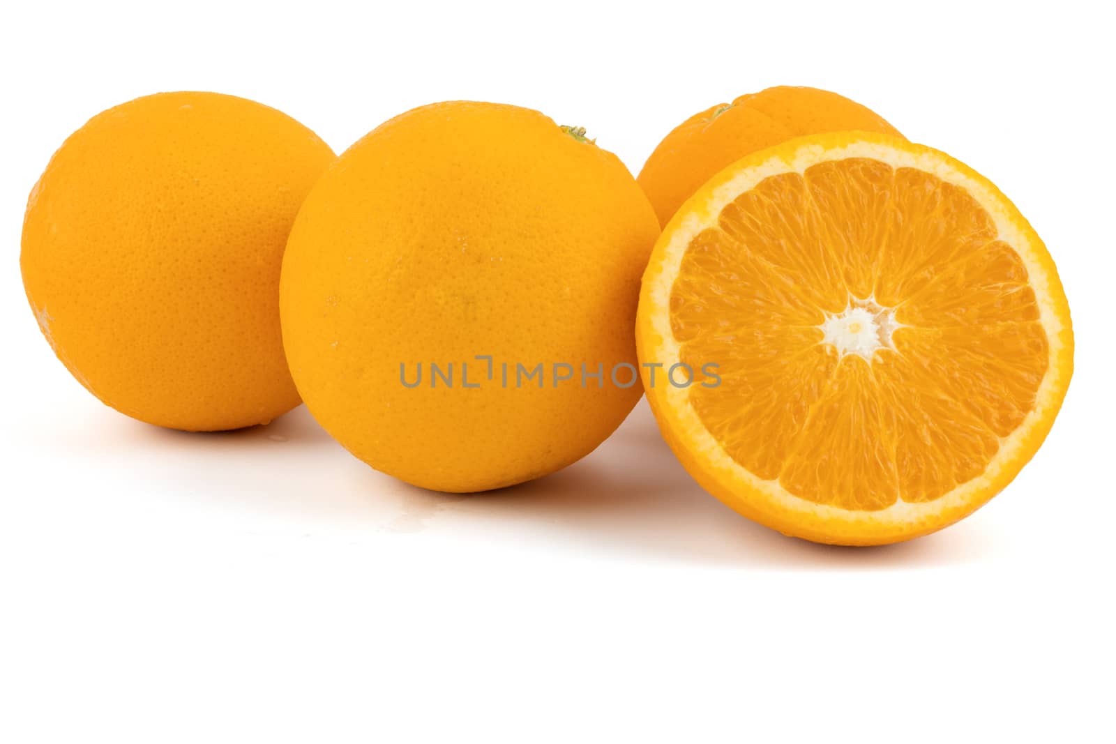Fresh navel oranges isolated on white background. Save with clipping path.