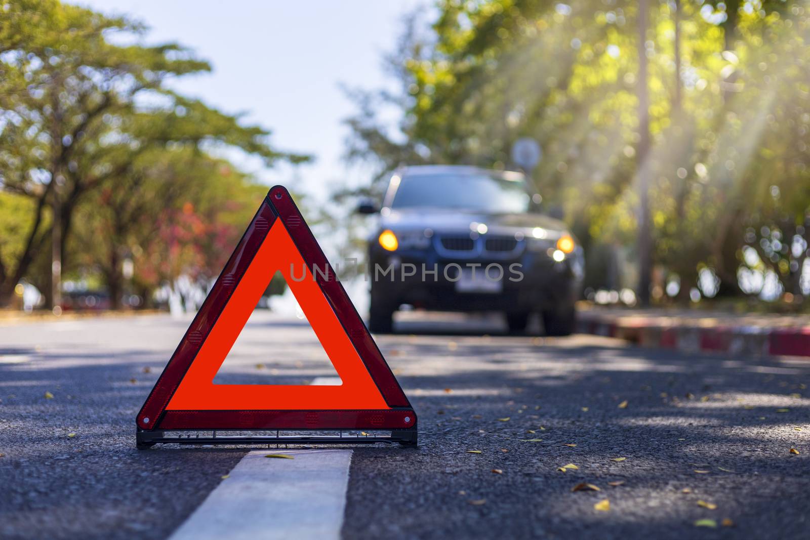 Red triangle, red emergency stop sign, red emergency symbol with  car stop and park on road.