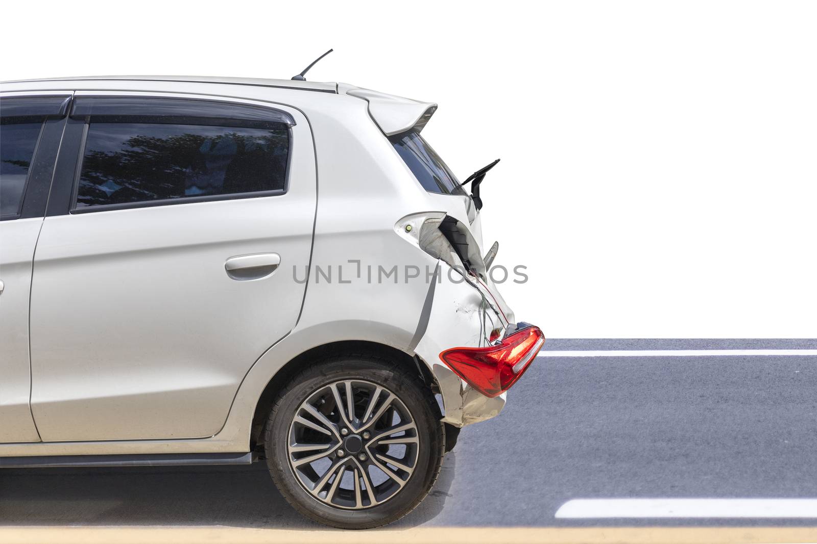 Back side of white color car big damaged and broken by accident on road parking can not drive any more. isolated on white background. Save with clipping path.