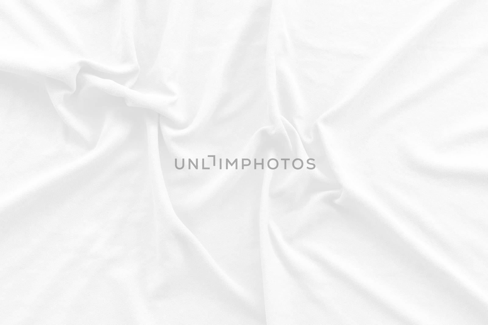 White cotton fabric texture background. Abstract white fabric with rippled background.White fabric with soft wave.  Soft focus technique. 