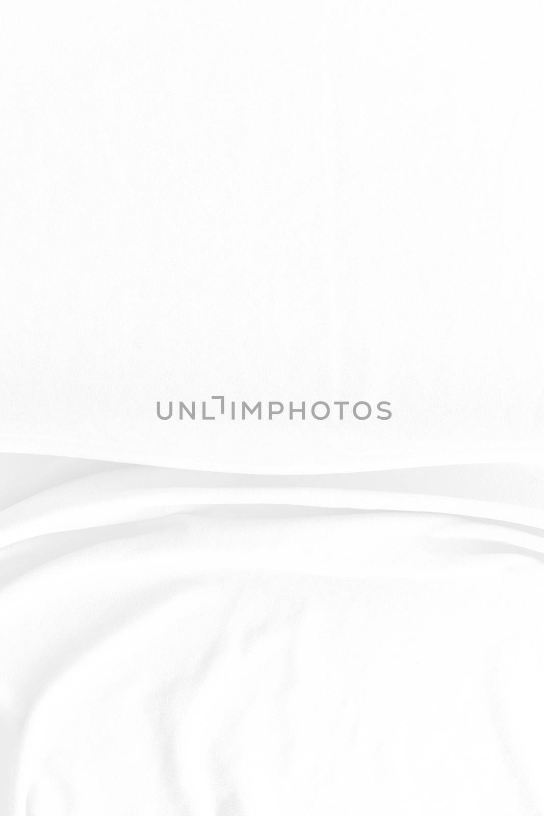 White cotton fabric texture background. Abstract white fabric with rippled background.White fabric with soft wave.  Soft focus technique. 