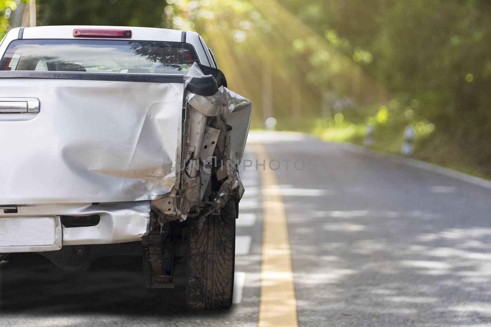 Back of gray color car big damaged and broken by accident on road parking can not drive any more. With copy space for text or design