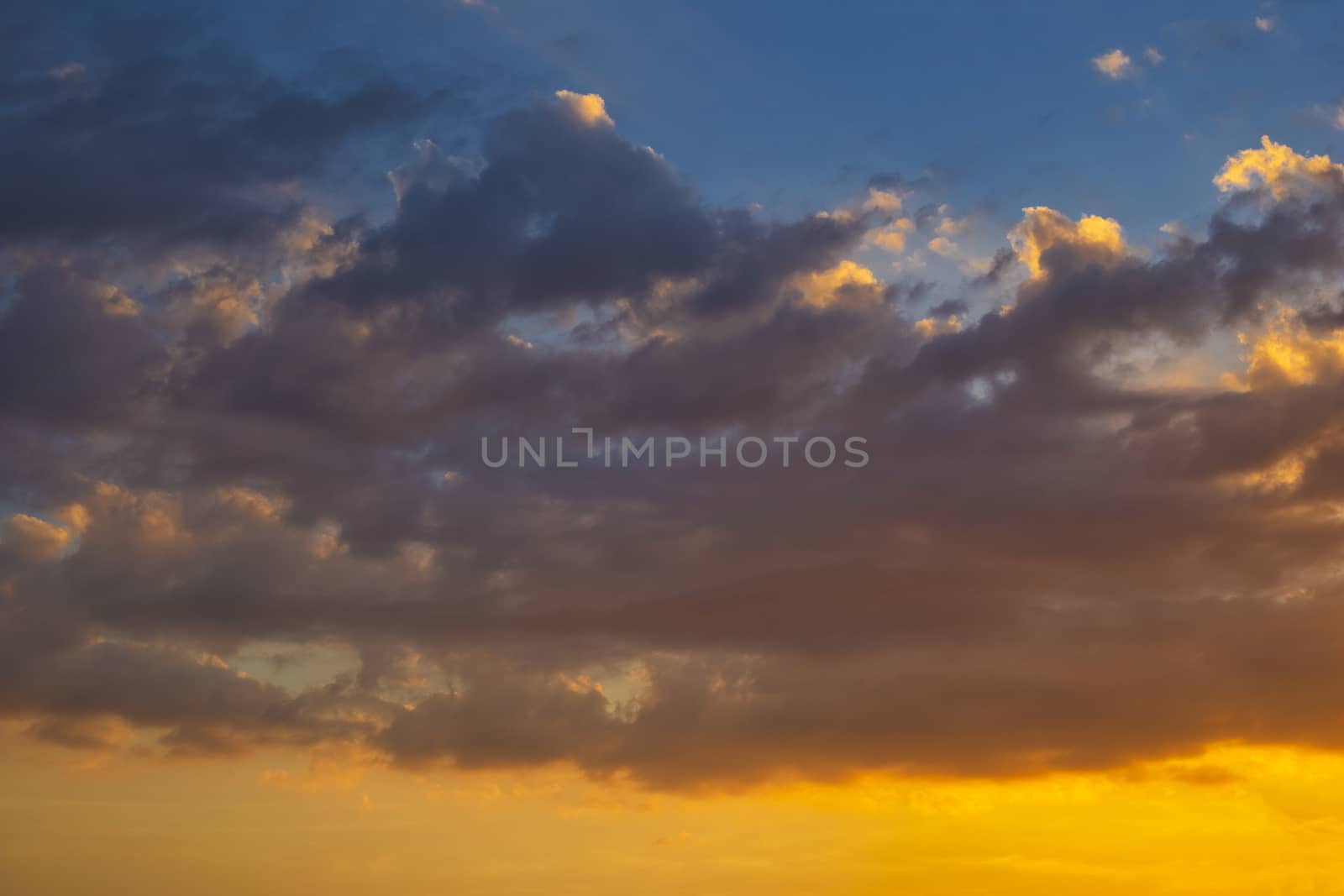 Sky with cloud and sun ray yellow and blue color background. With copy space for text or design.