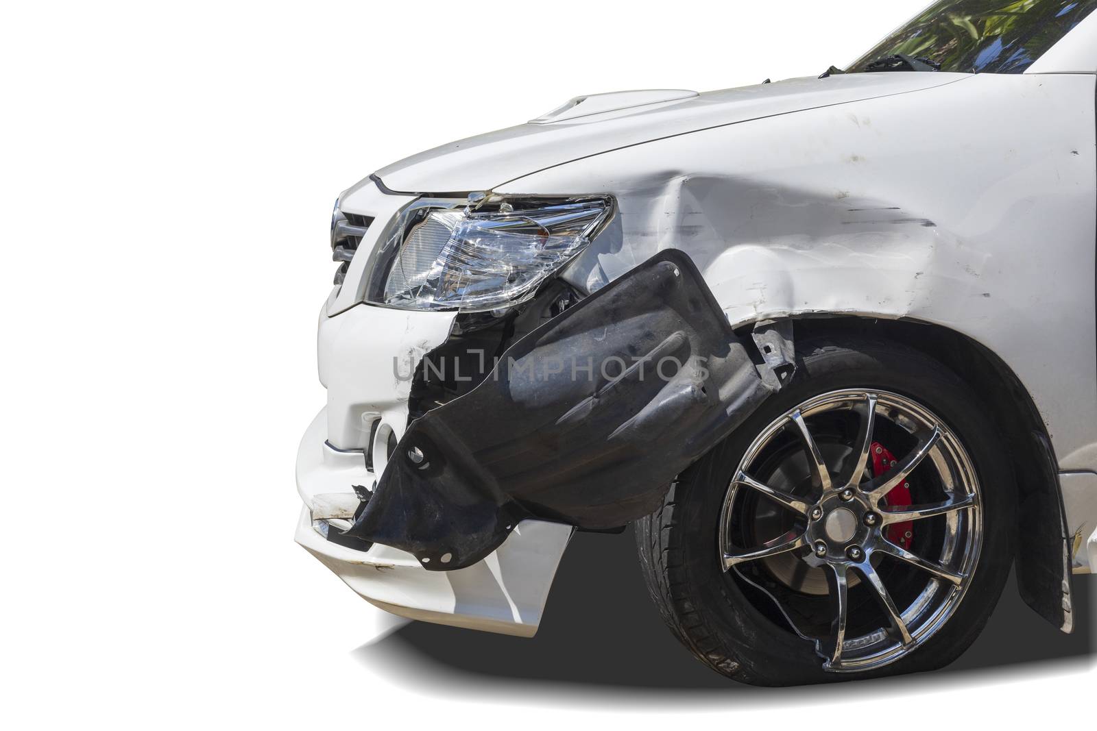 Front of white color car big damaged and broken by accident isolated on white background.