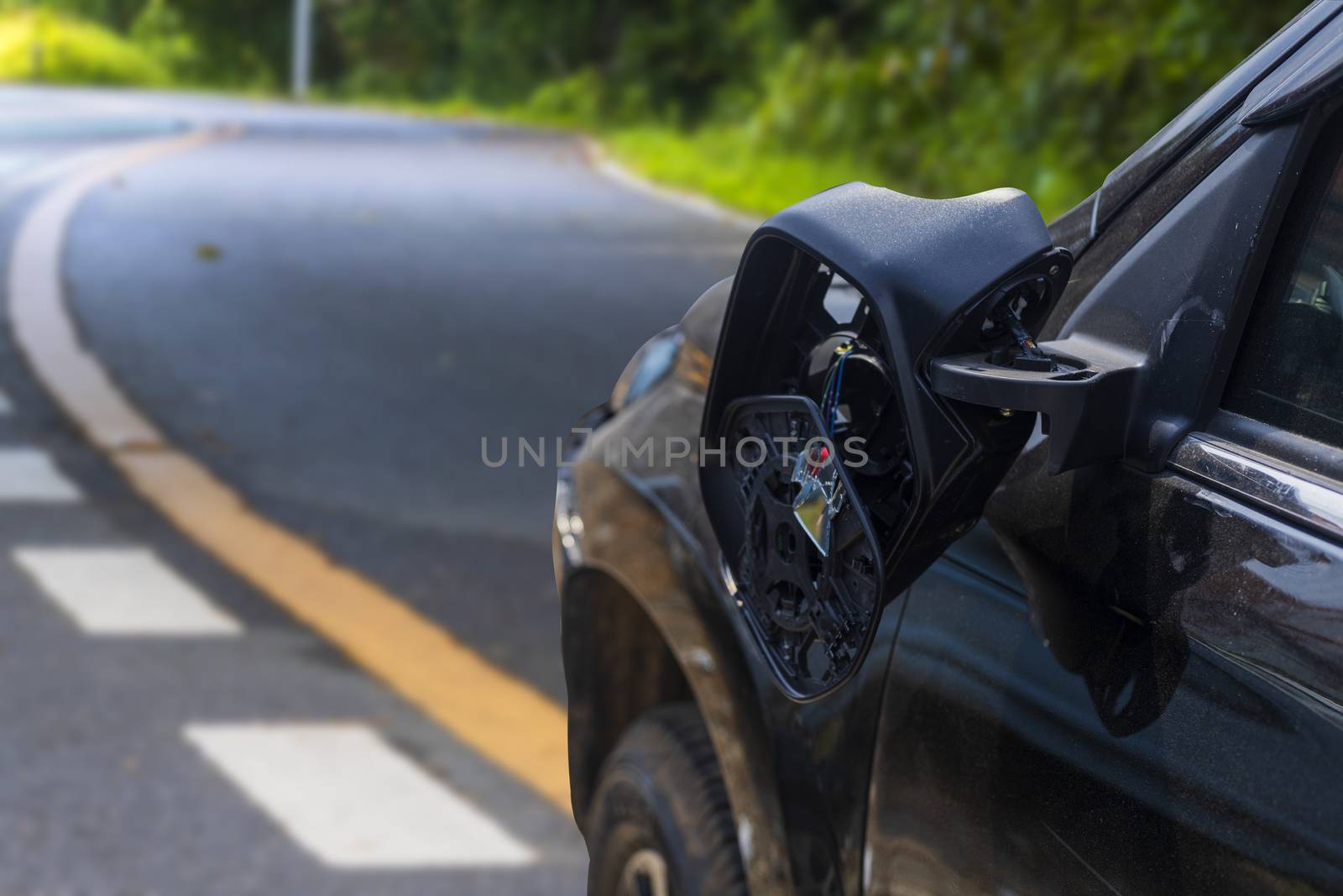 Car accident broken car rearview mirror. car accident on road.