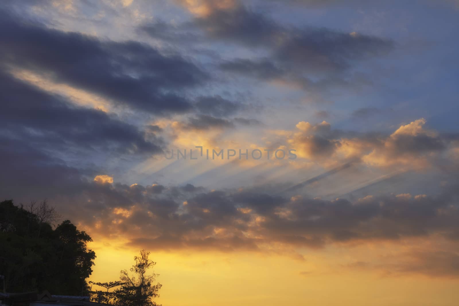 Sky with cloud and sun ray yellow and blue color background. With copy space for text or design.