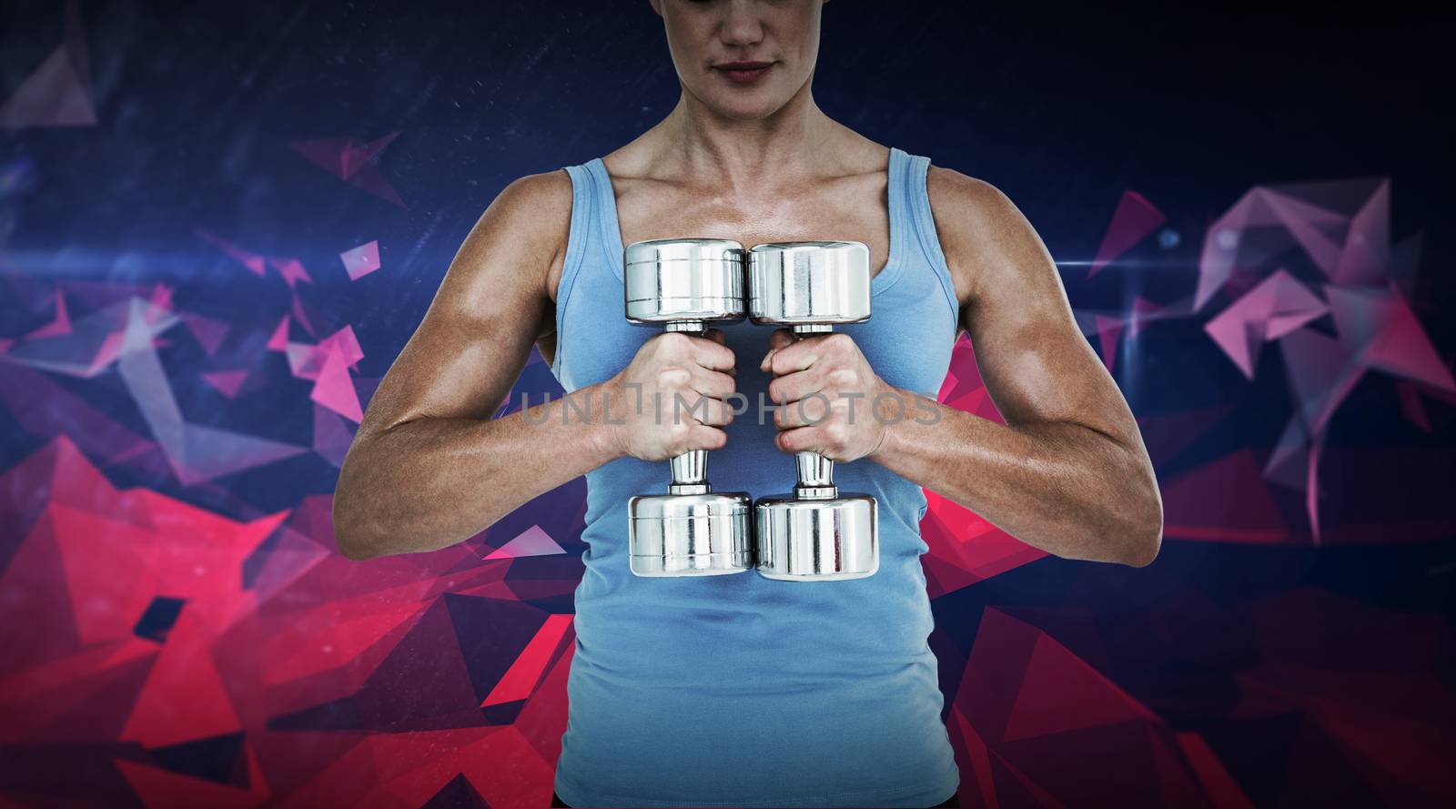 Muscular woman exercising with dumbbells  against dark abstract design