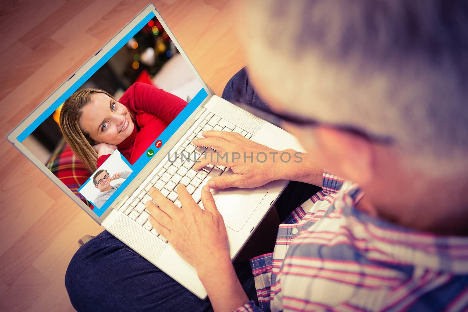 Man using laptop while sitting on floor at home against casual man sitting at desk with laptop