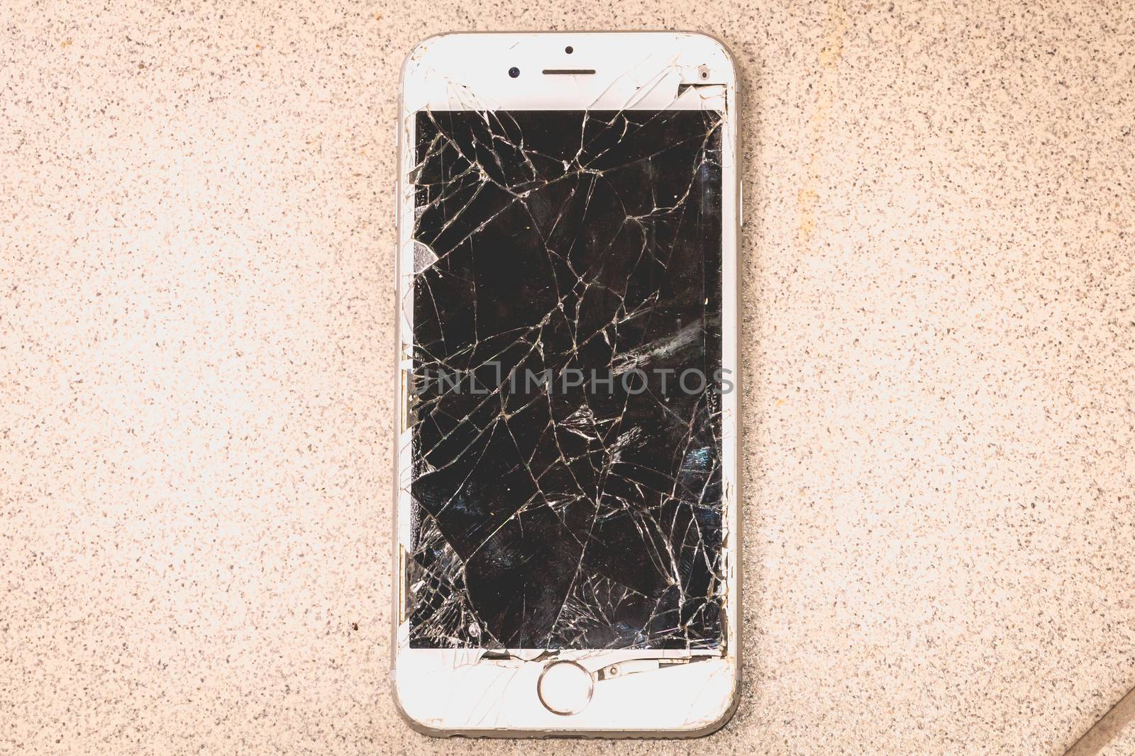 Broken iPhone 6S developed by the company Apple Inc by AtlanticEUROSTOXX