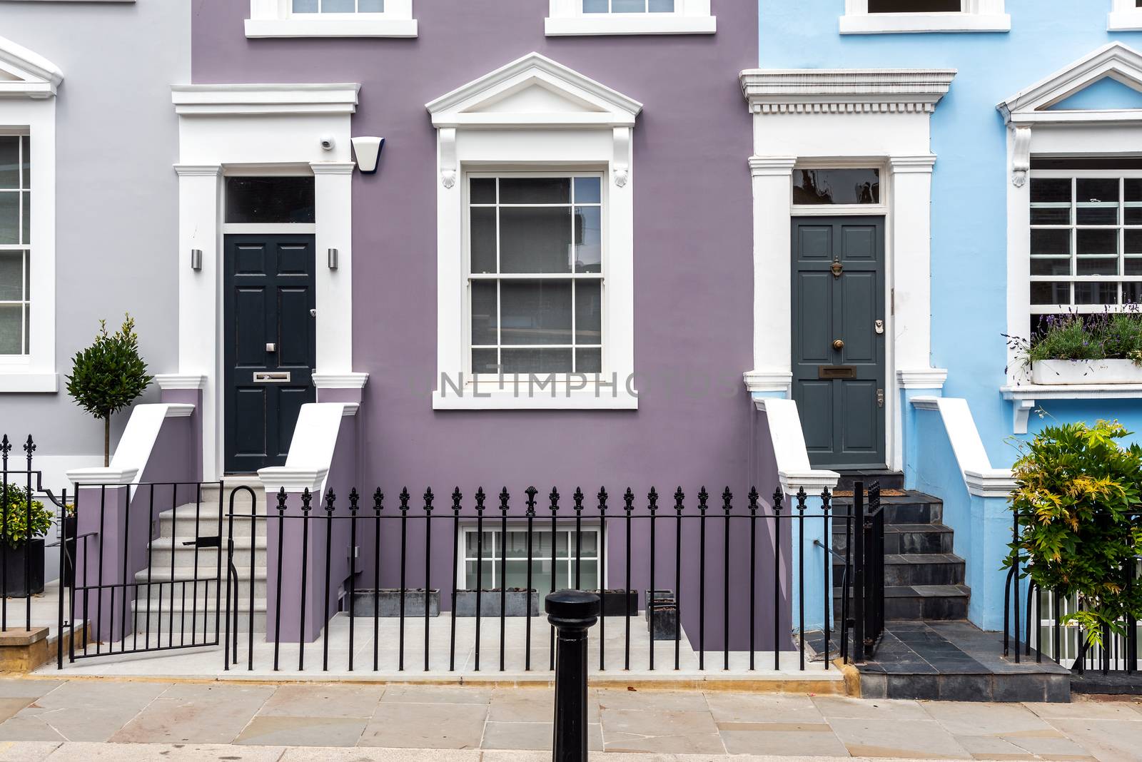 Entrances to some typical english row houses seen in Notting Hill, London