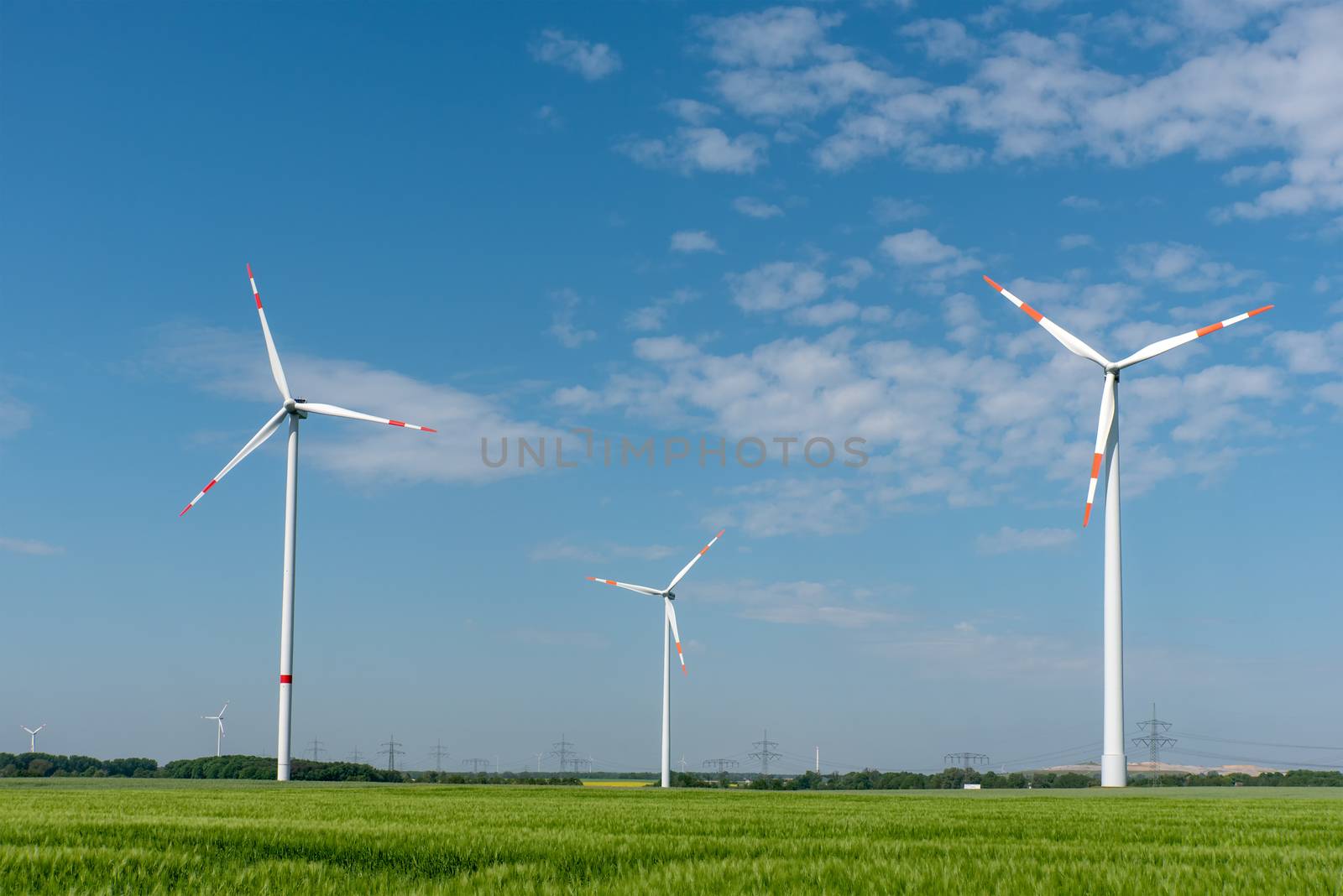 Wind turbines in the fields by elxeneize