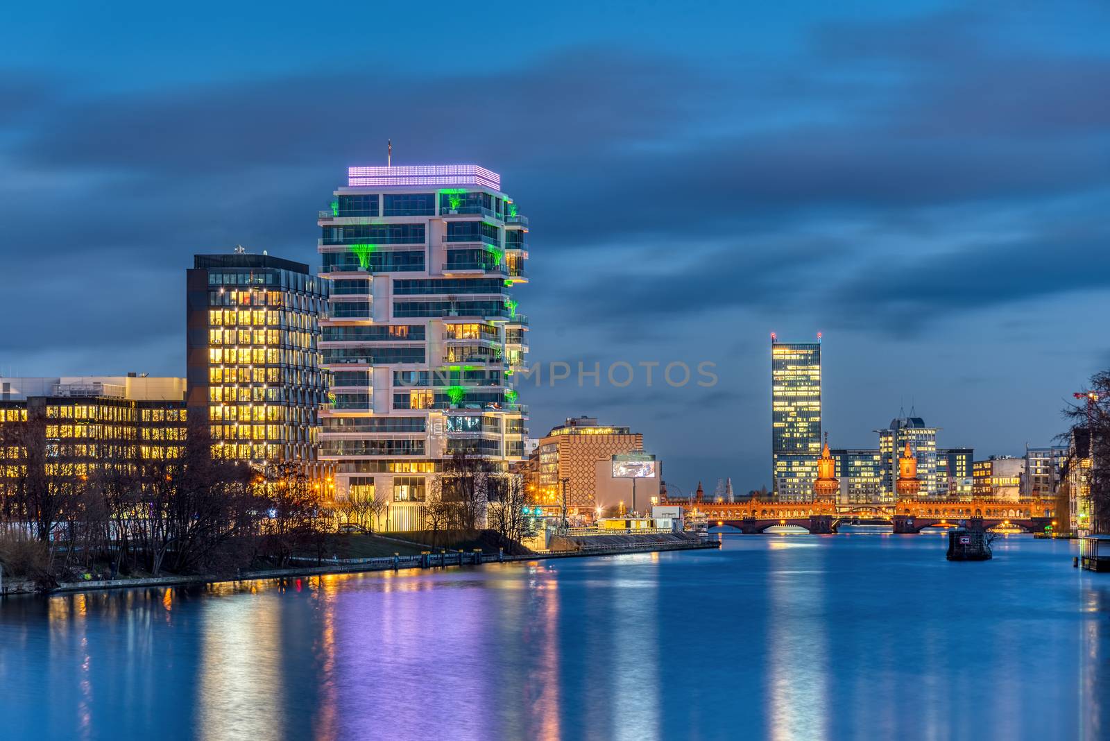 The river Spree in Berlin at night with the Oberbaum Bridge in the back