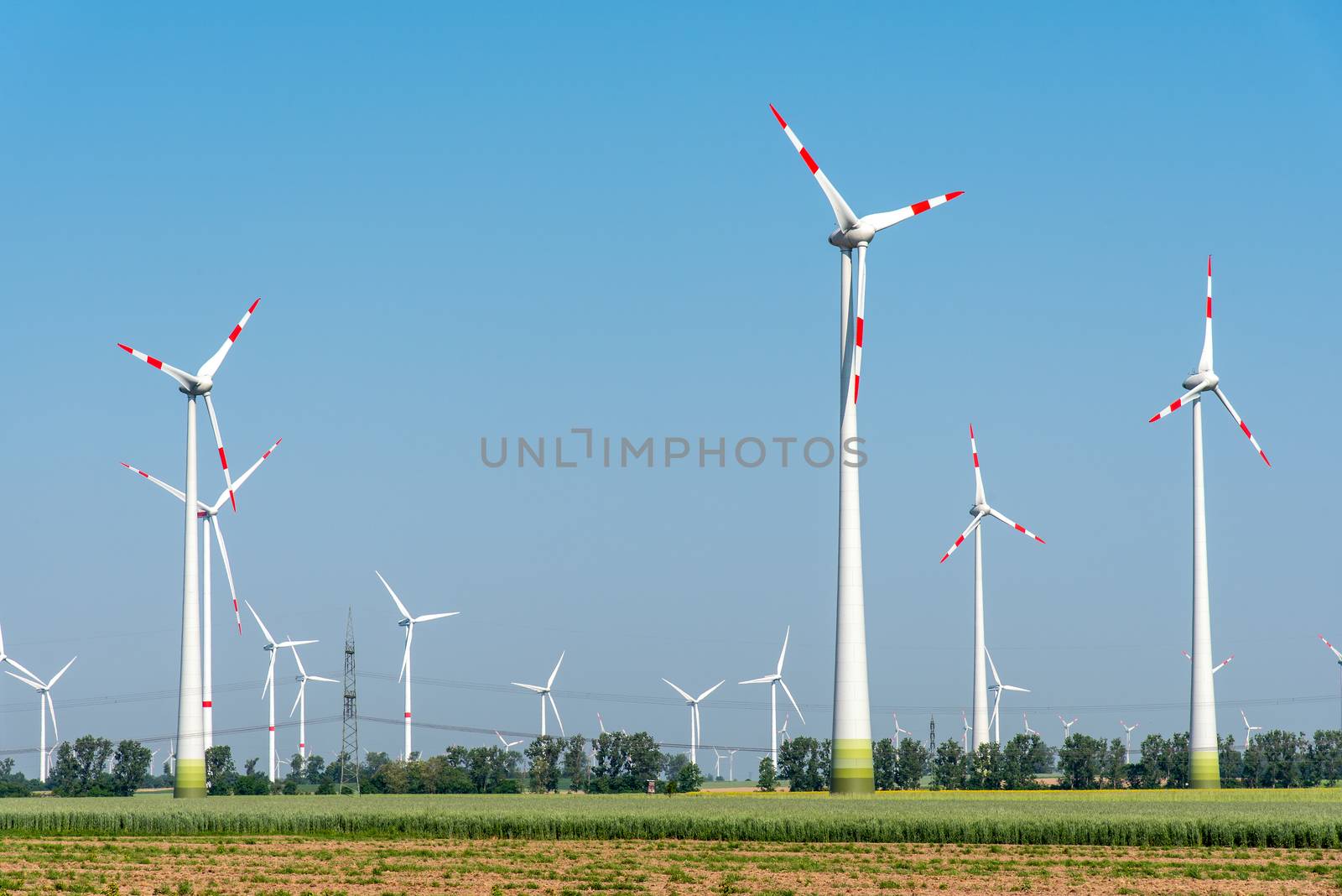 Wind power plants in the fields seen in rural Germany