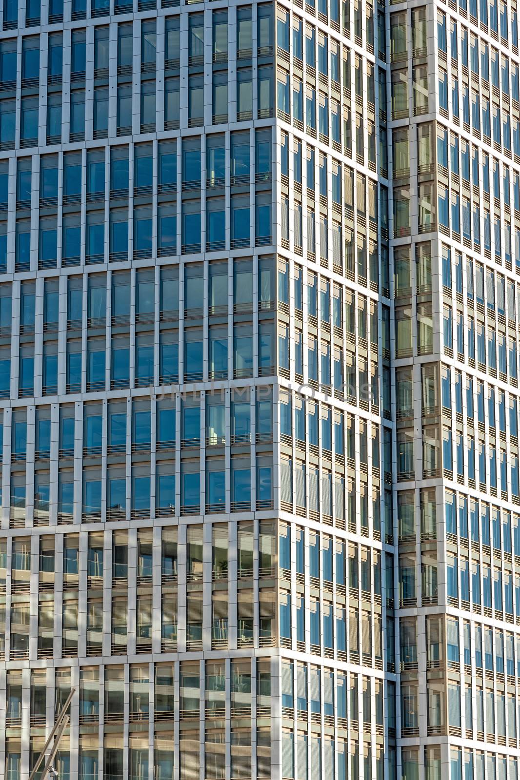 Glass facade of a modern office building seen in Hamburg, Germany