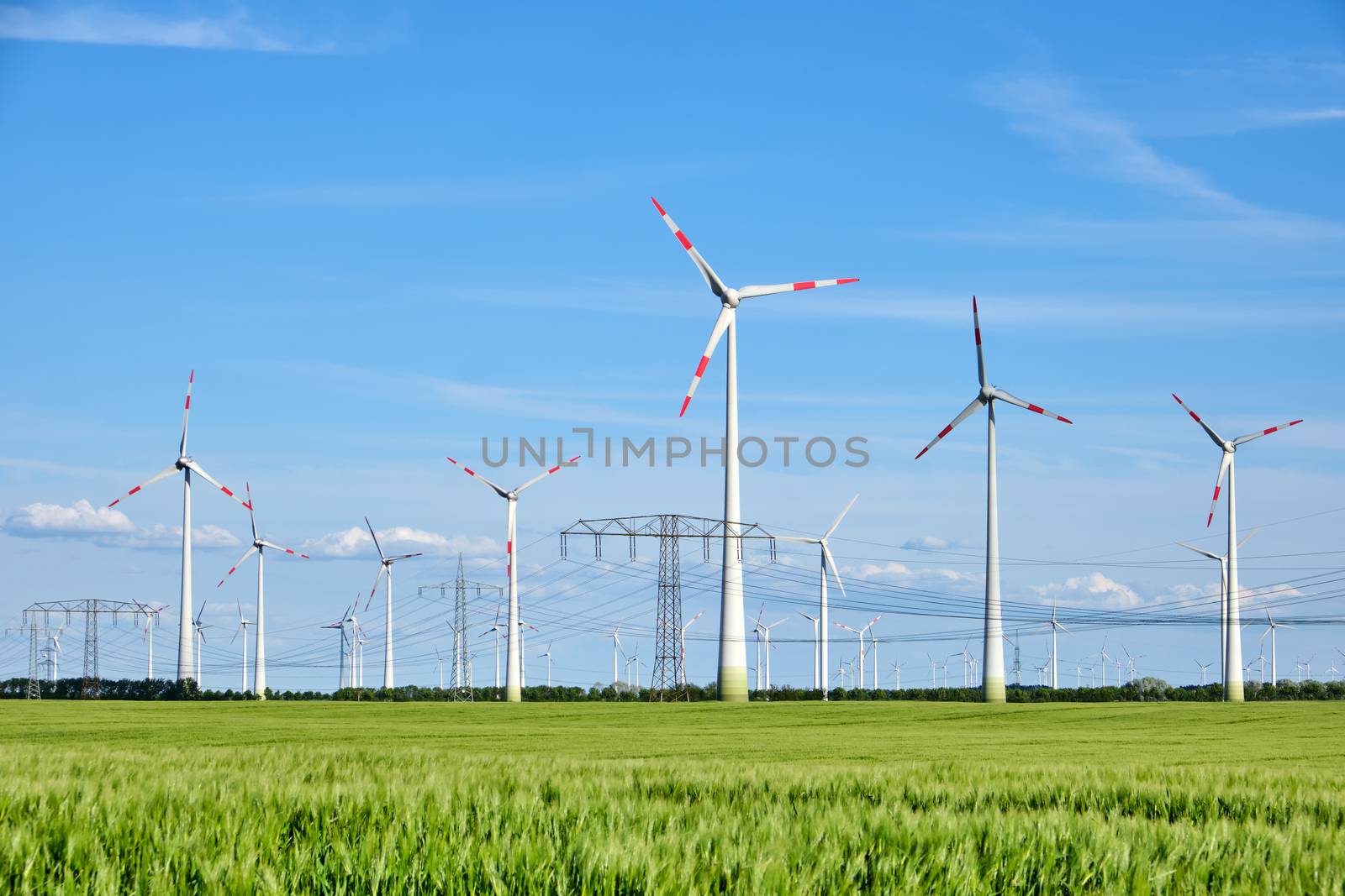 Wind wheels and overhead power lines seen in Germany