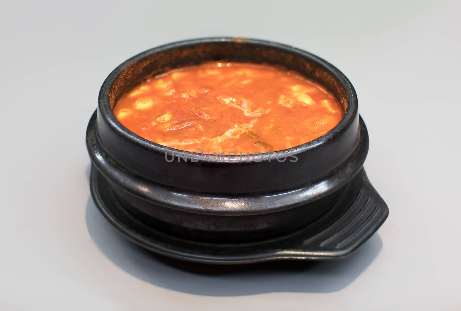 Traditional Korean Kimchi soup isolated on white background.