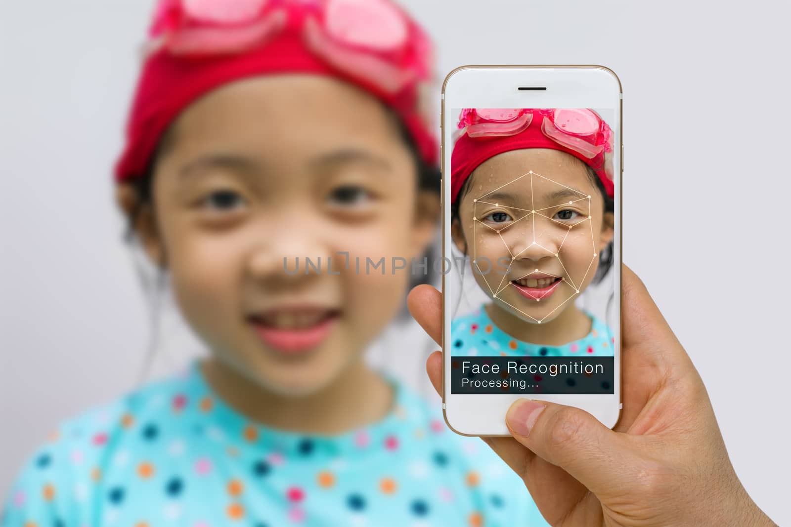 Concept of biometric verification, face recognition technology, using app on smartphone.