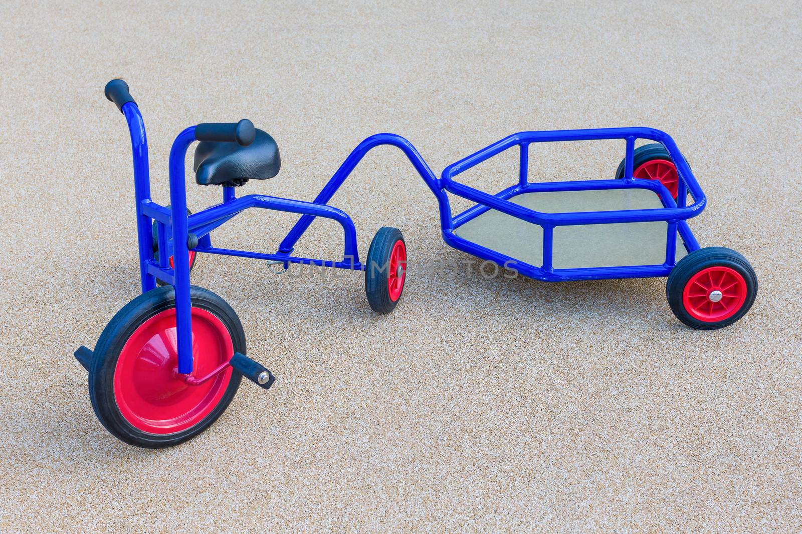 Tricycle for kids of children in playground.