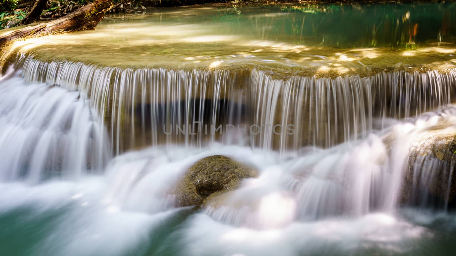 Waterfall landscape of tropical rainforest in Thailand.