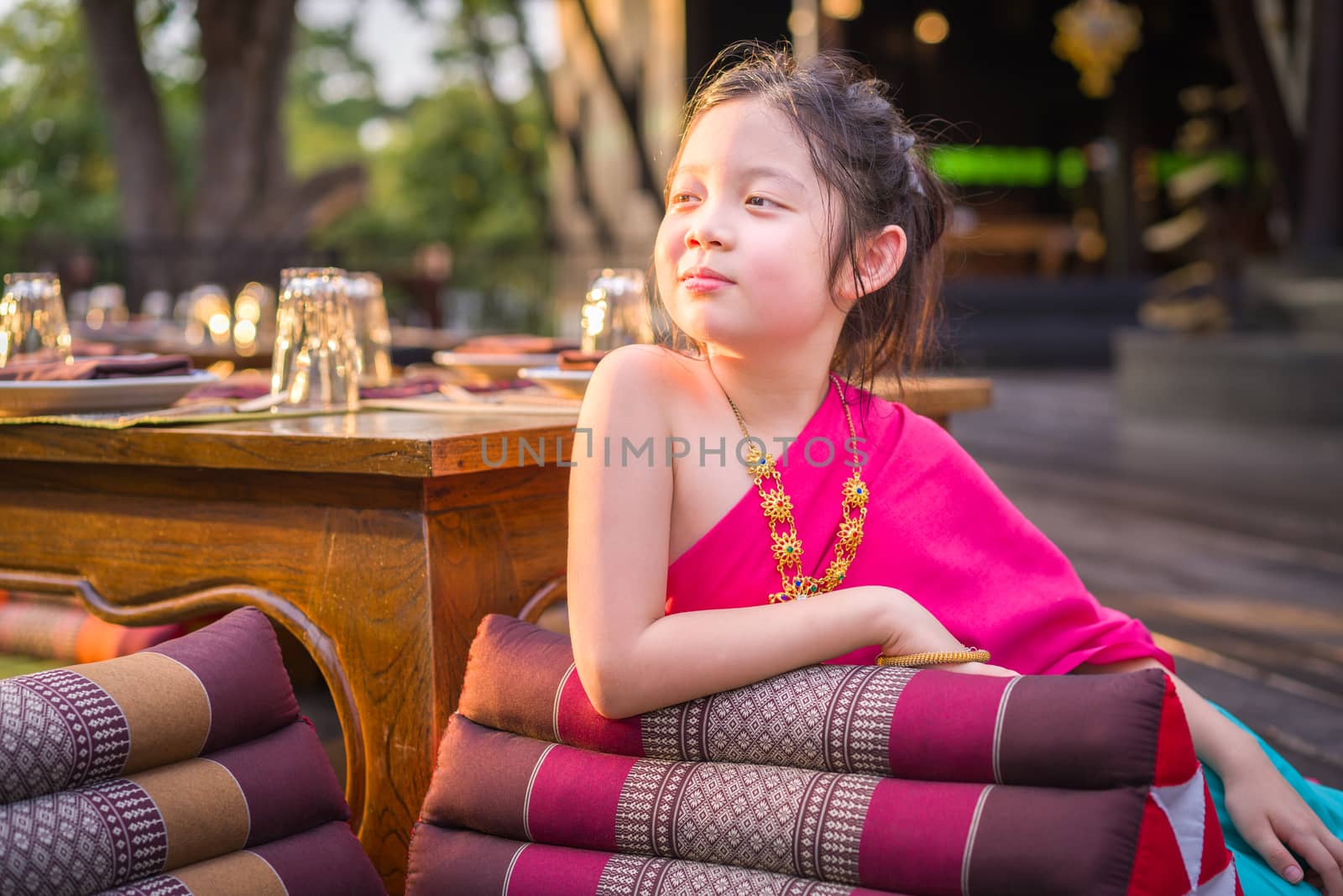 Child, Thai girl, in traditional Thai costume.