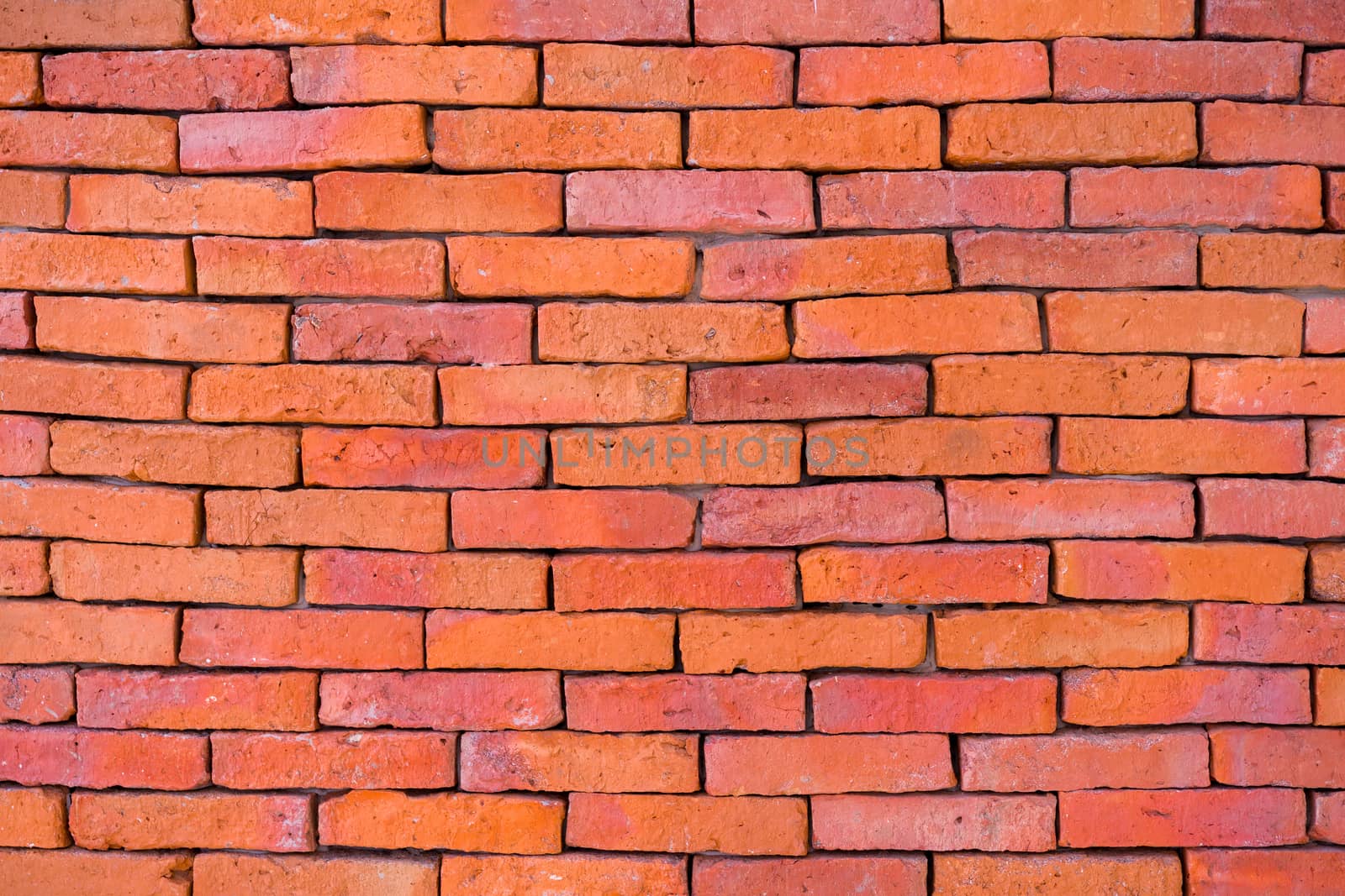 Red brick wall texture for background or wallpaper.
