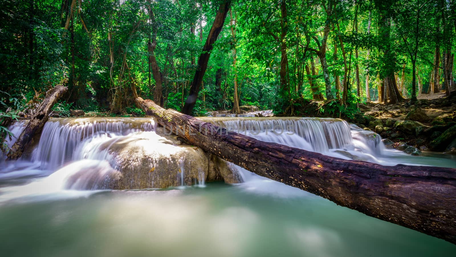 Waterfall landscape of tropical rainforest in Thailand.