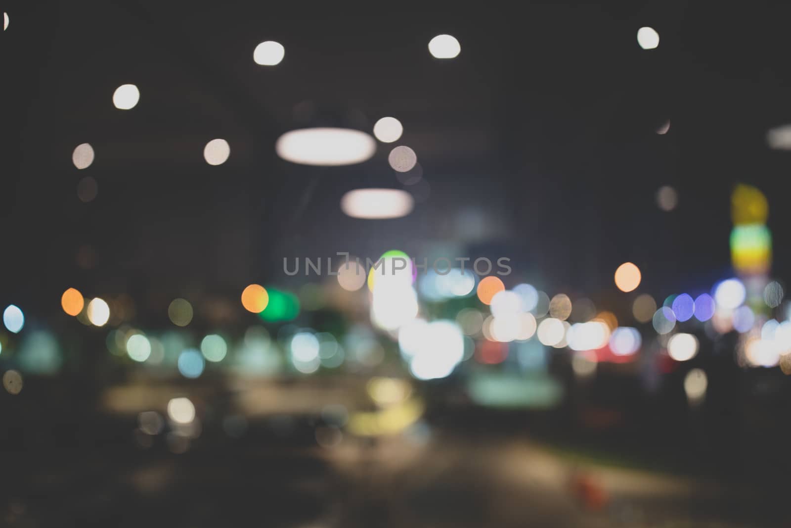 Vintage film look of restaurant or bar background with bokeh.