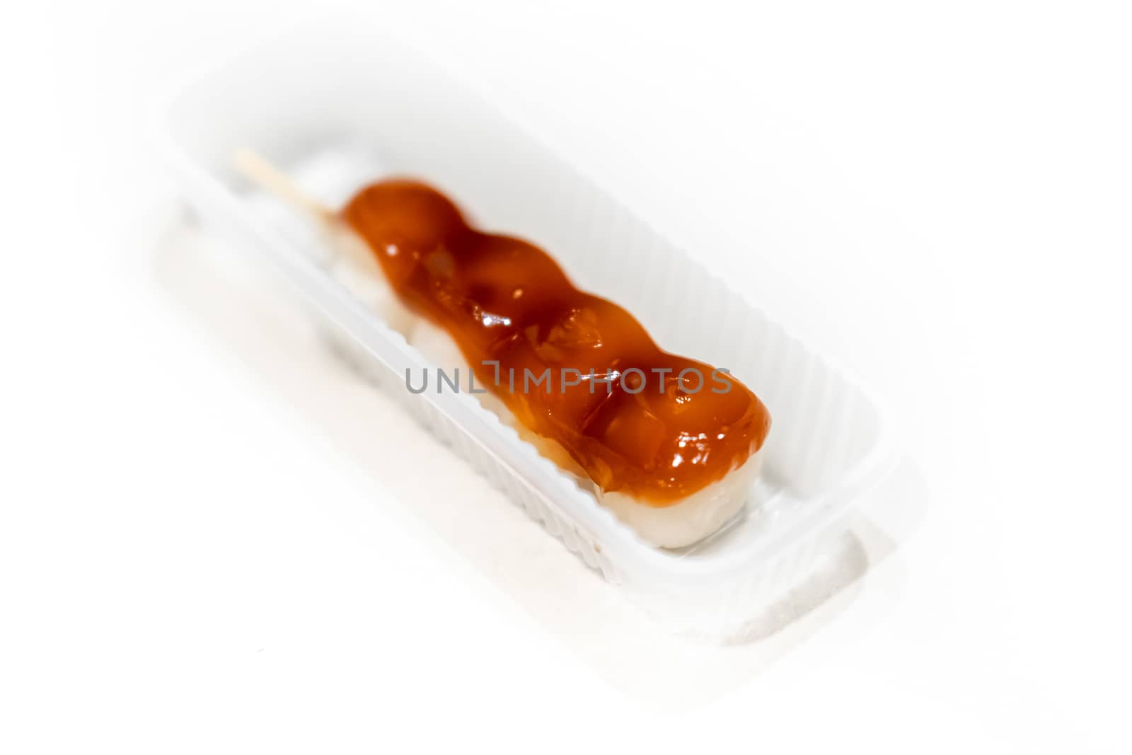 Isolated shot of Dango, Japanese traditional dessert, on white background.