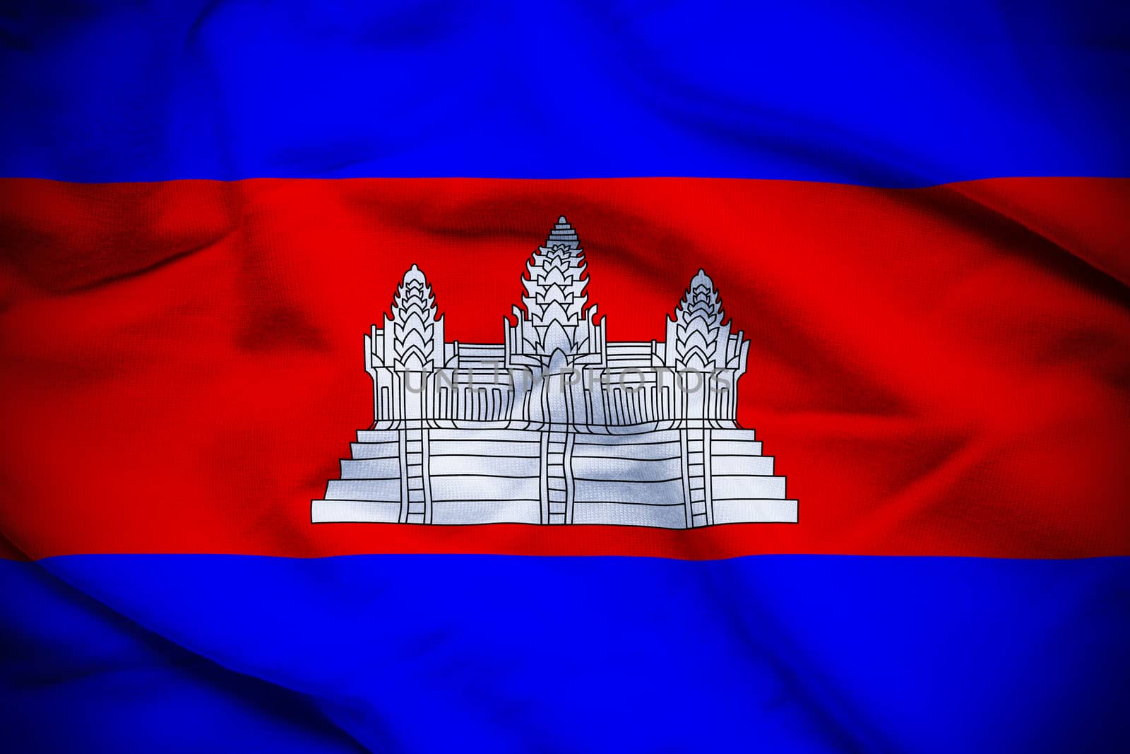 Wavy and rippled national flag of Cambodia background.