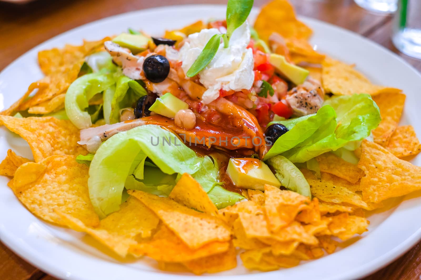Traditional Mexican style vegetable salad with nacho.