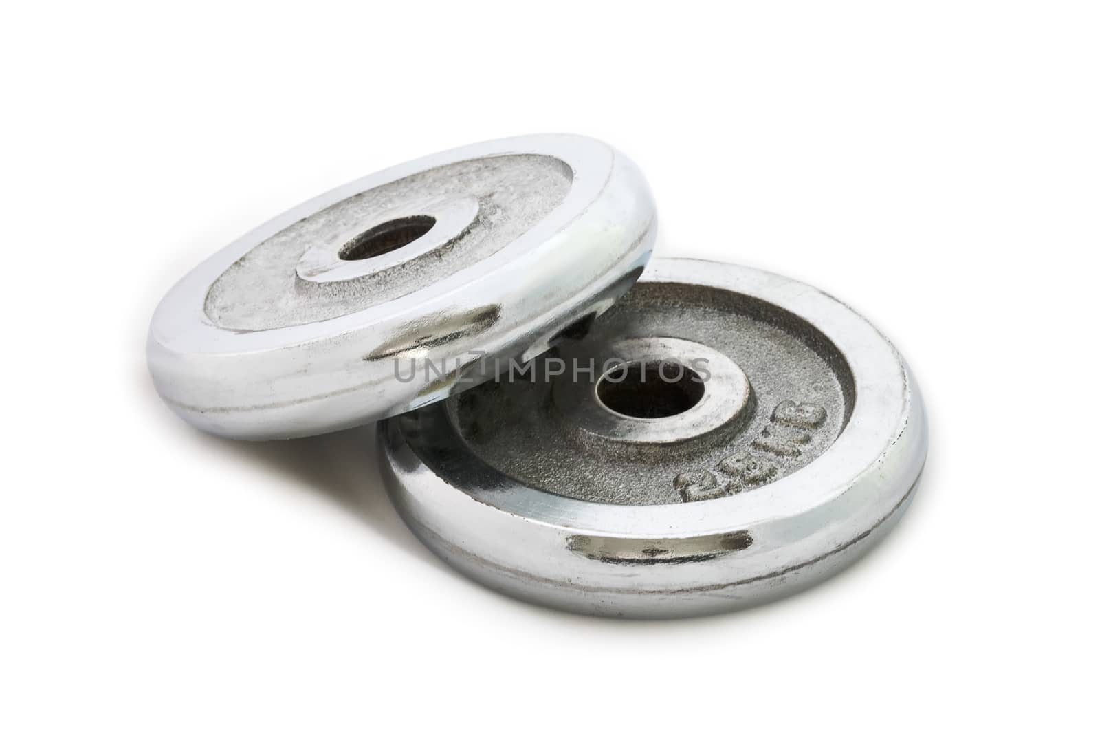 Stack of iron plates for weight training isolated on white background.
