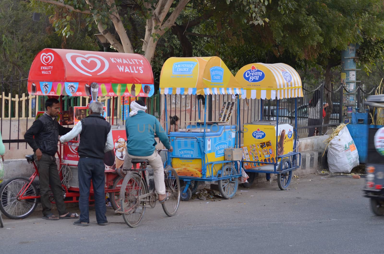 New Delhi, India, 2020. Cream bell, Mother dairy and Walls Ice cream stalls near India gate. A central spot for tourists and locals, most people go out to eat ice cream in the evening at these stalls.