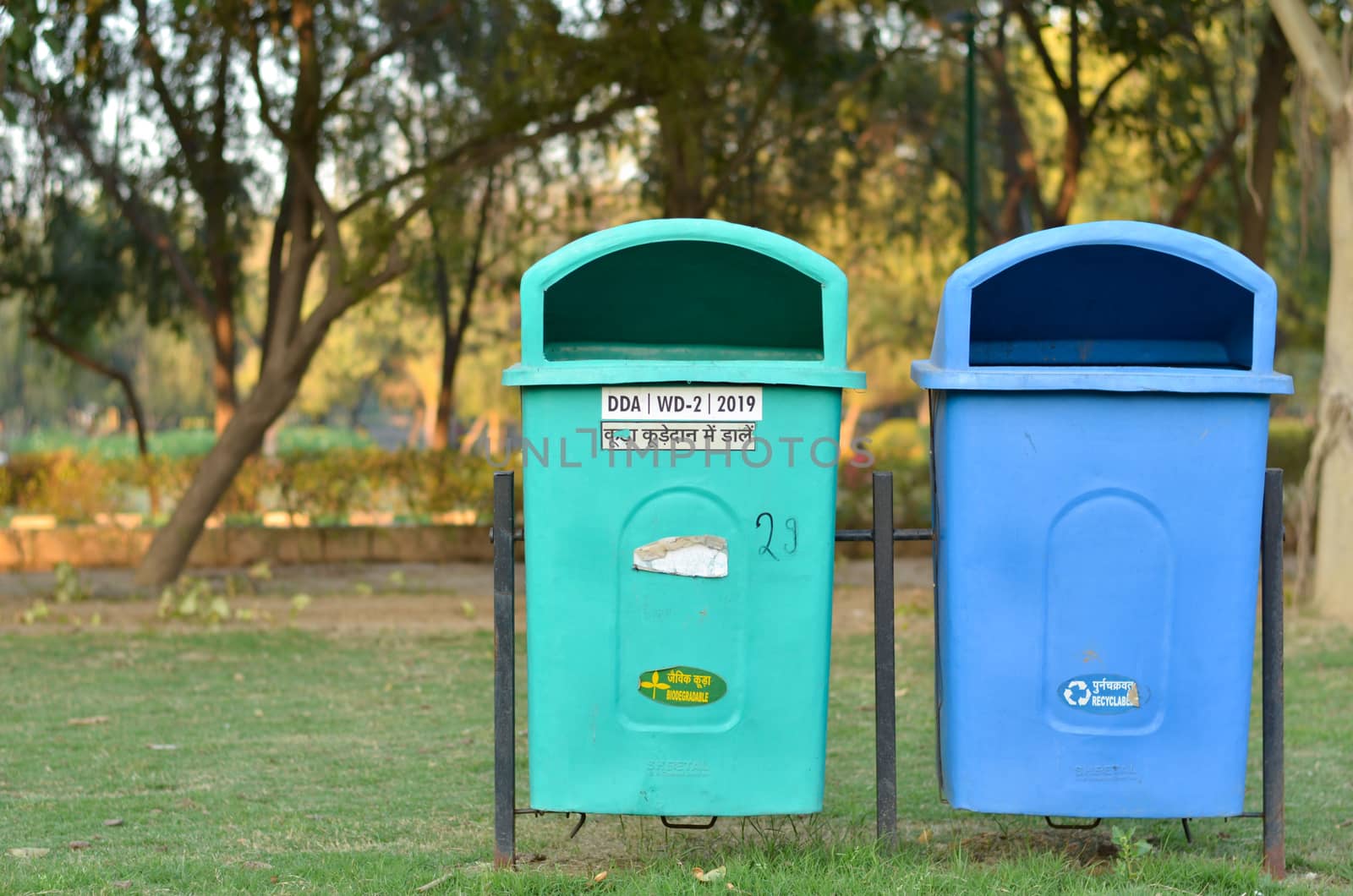 New Delhi government has installed a lot of green & blue dustbins throughout the city, this one in a park. The green ones for organic waste, & blue for non organic, non recyclable waste