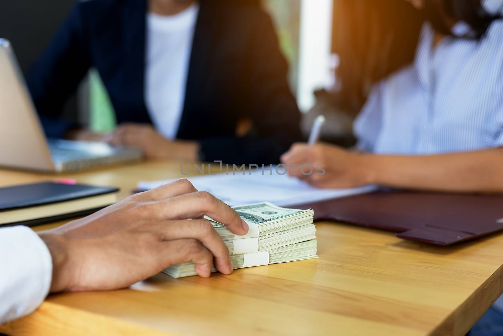 Business woman signing a loan for investment, negotiation